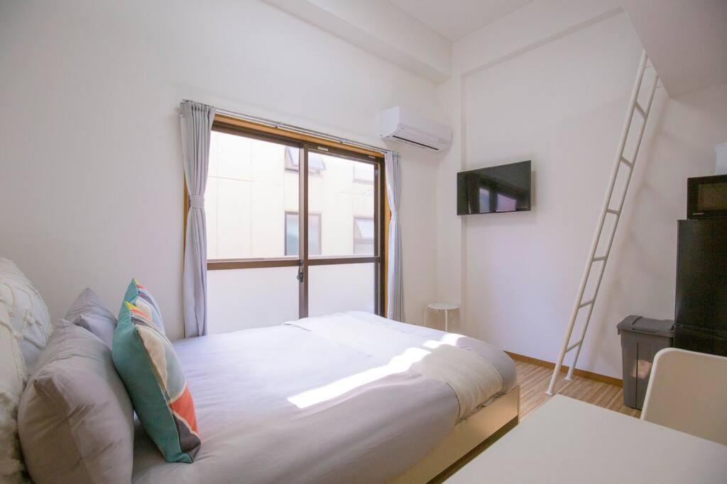 閑静な住宅街_暖かく居心地の良いデザイン Eos-J Токио Экстерьер фото